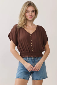 Brown v neck button detailed blouse with smocked waistband and button details in lightweight fabric