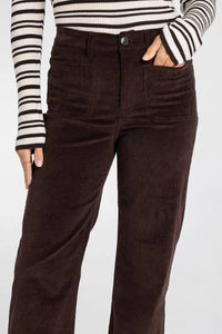 Brown corduroy supply gladys pants with high-rise fit, button closure, and multiple front pockets