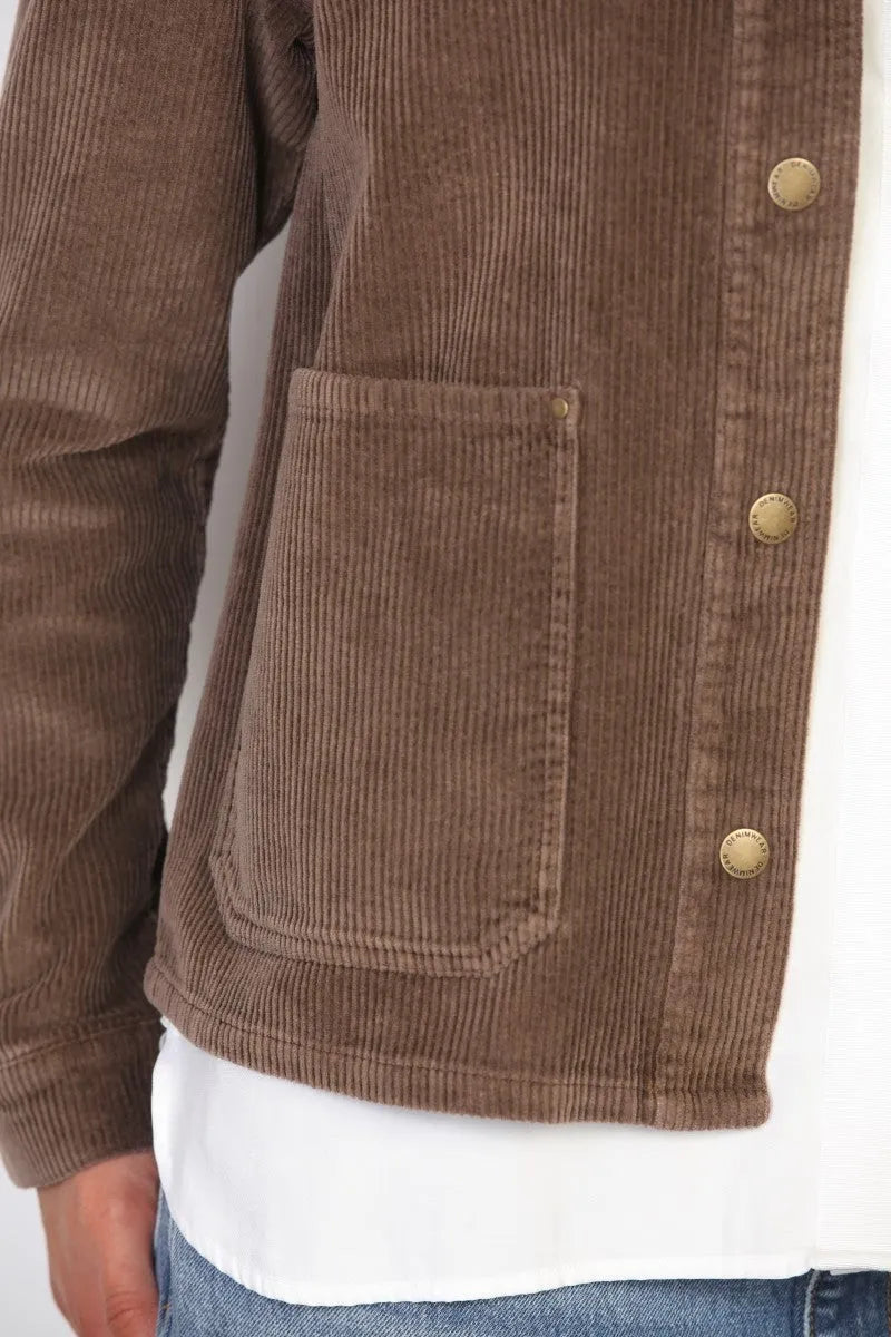 Brown garment washed corduroy chore jacket with matching buttons and single chest pocket in washed corduroy fabric