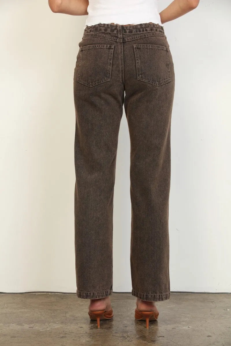 Brown overdyed straight leg denim jeans with relaxed fit and classic back pockets shown from the back side