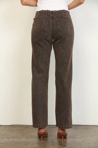Brown overdyed straight leg denim jeans with relaxed fit and classic back pockets shown from the back side