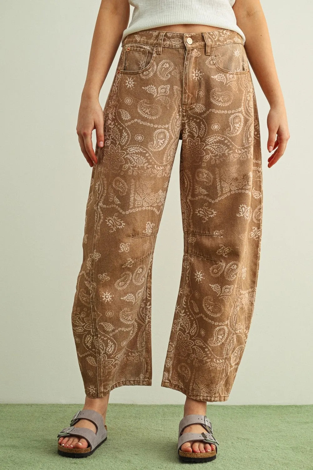 Brown denim paisley print washed pants with subtle lighter brown paisley pattern for casual wear