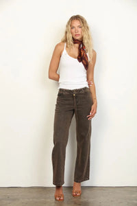 Brown overdyed straight leg denim jeans with high-waisted drawstring waistband and frayed hems