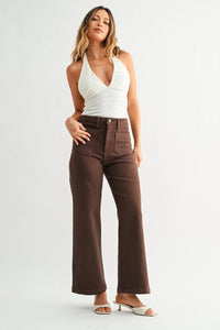 Brown high-waisted wide leg denim jeans with patch pockets and subtle stitching details in classic five-pocket design