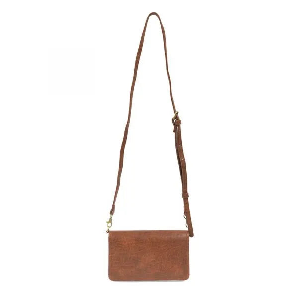 Brown leather billie mini organizer crossbody bag with textured surface and adjustable strap for hands-free use