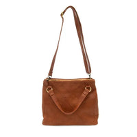 Brown leather janet puzzle convertible crossbody tote with quilted diamond pattern and gold-tone hardware