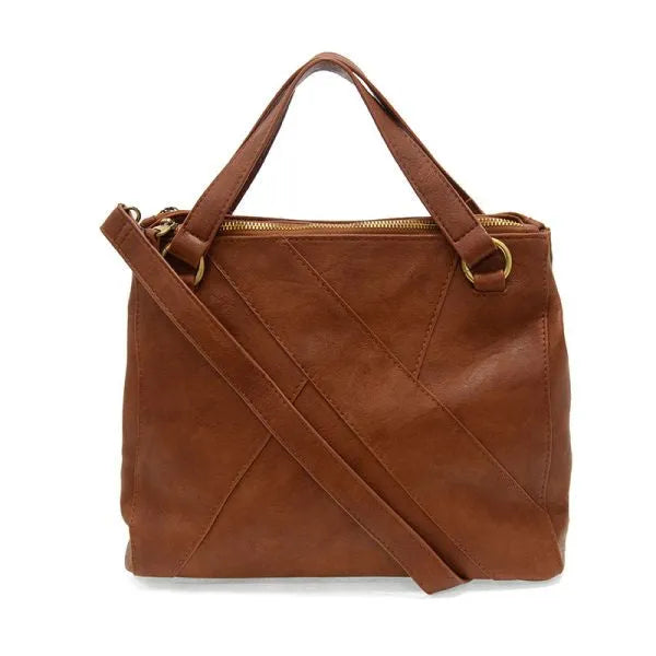 Brown leather janet puzzle convertible crossbody tote with gold hardware and diagonal strap design