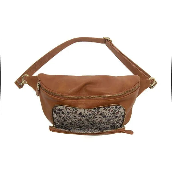Brown leather rory organizer sling belt bag with floral interior lining and gold-tone zippers for stylish storage
