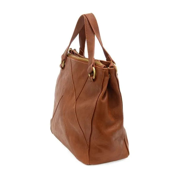 Brown leather janet puzzle convertible crossbody tote with gold-tone hardware and structured design