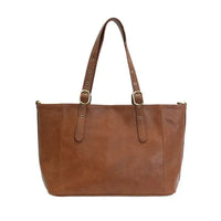 Brown leather shelby studded tote bag with sturdy handles and gold-tone hardware for stylish everyday use