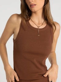 Brown ribbed knit sleeveless top with rounded neckline in the edlin basic tank by thread and supply