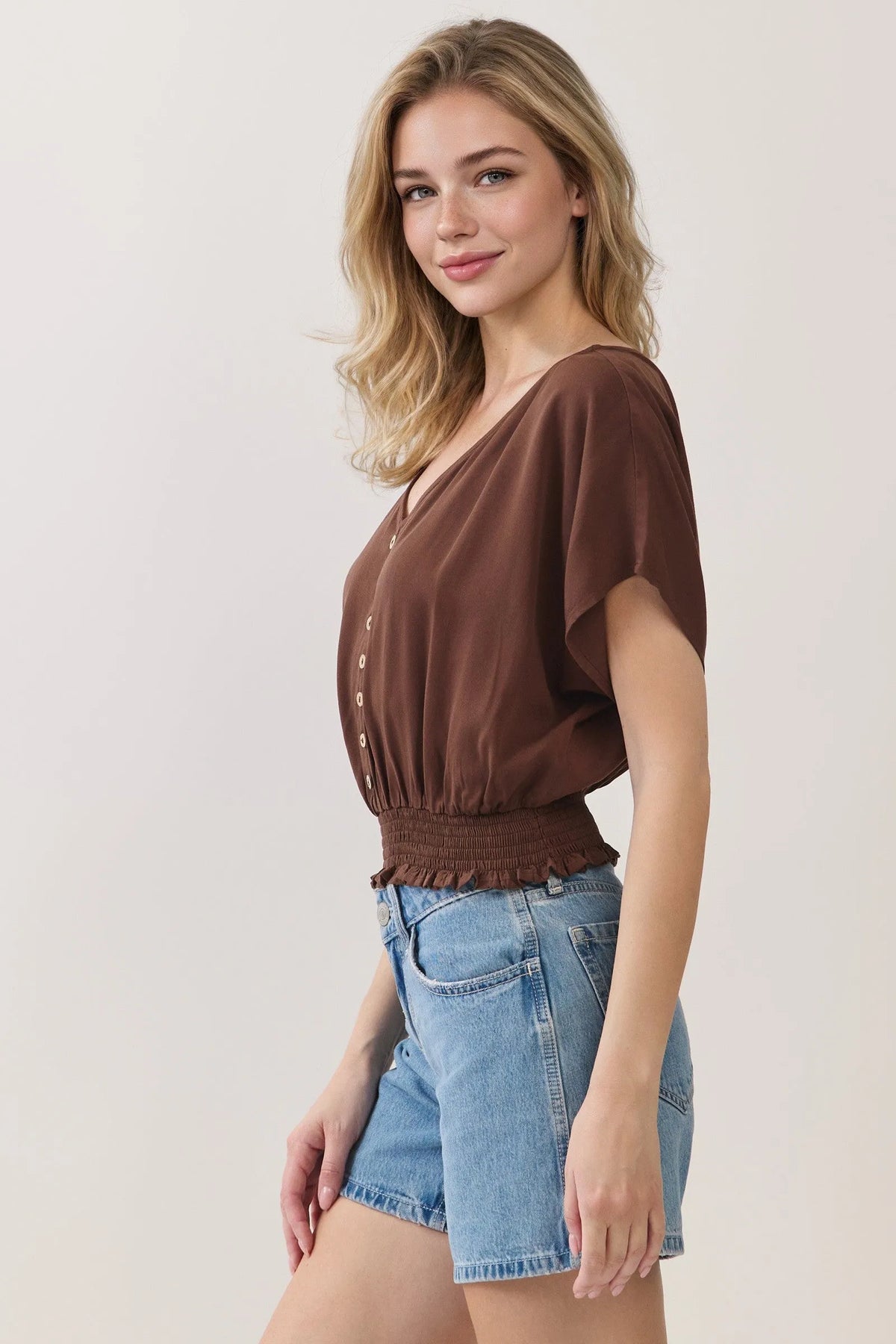 Brown satin v neck button detailed blouse featuring button front detail for elegant formal wear