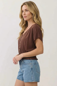 Brown short-sleeved v neck button detailed blouse with ruffled hem perfect for casual or office wear