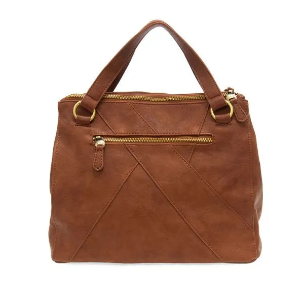 Brown suede janet puzzle convertible crossbody tote with gold tone zippers and hardware for versatile use