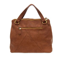 Brown suede janet puzzle convertible crossbody tote with gold tone zippers and hardware for versatile use