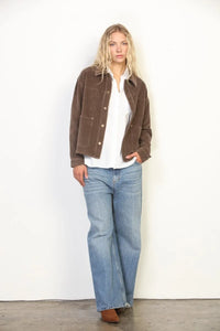 Brown suede garment washed corduroy chore jacket with button closures and flap pockets in washed corduroy chore style