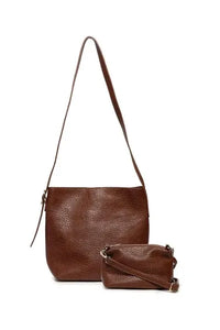 Brown textured leather bucket crossbody with matching crossbody pouch showcasing main bag features