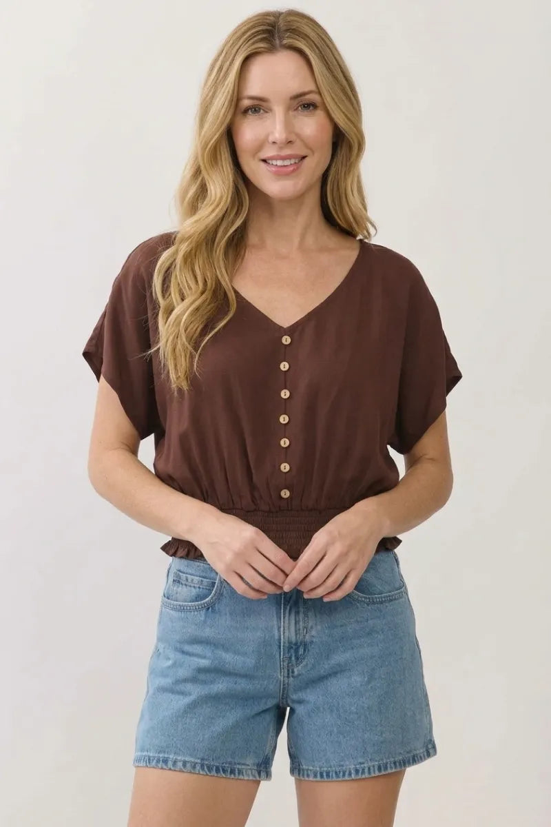 Brown v neck button detailed blouse with short flutter sleeves and button down front made from lightweight fabric