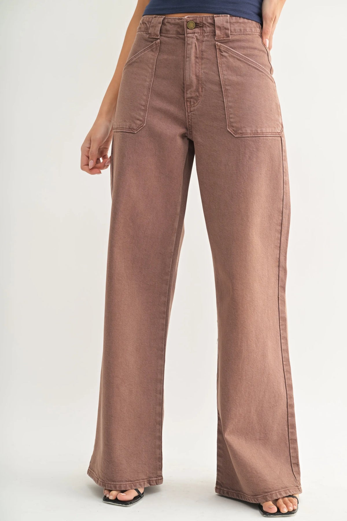 Brown high rise patch pocket wide leg flare denim jeans with two front pockets in a wide leg flare style