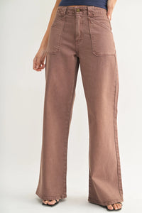 Brown high rise patch pocket wide leg flare denim jeans with two front pockets in a wide leg flare style