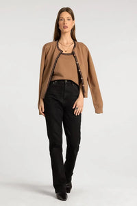 A camel-colored cardigan with black trim and decorative buttons paired with supply brittania tank