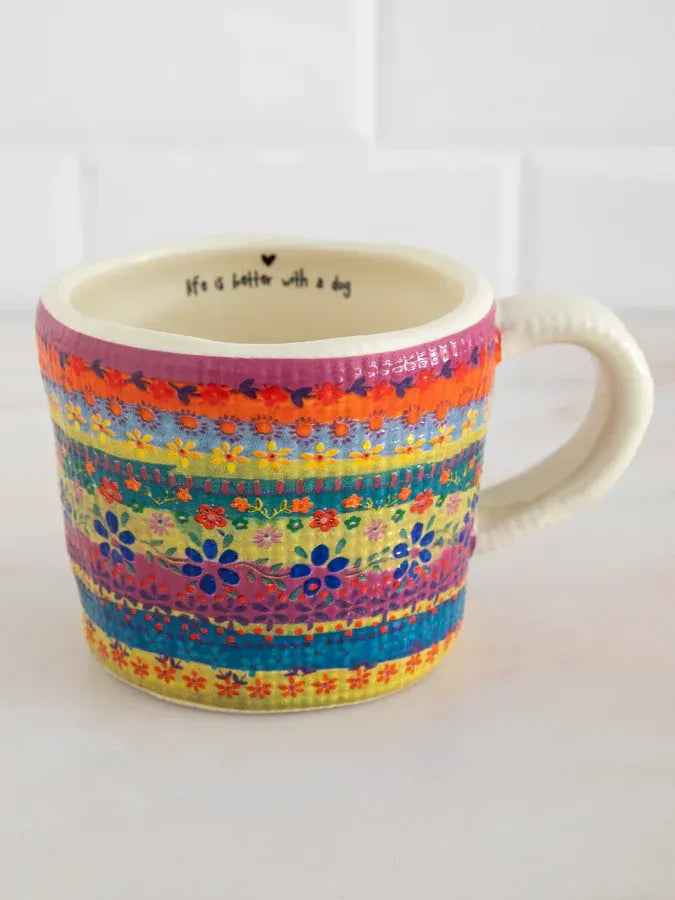 Peek a boo coffee mug colorful ceramic with vibrant floral stripes and life is better with a dog inside text