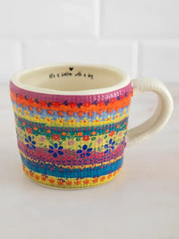 Peek a boo coffee mug colorful ceramic with vibrant floral stripes and life is better with a dog inside text