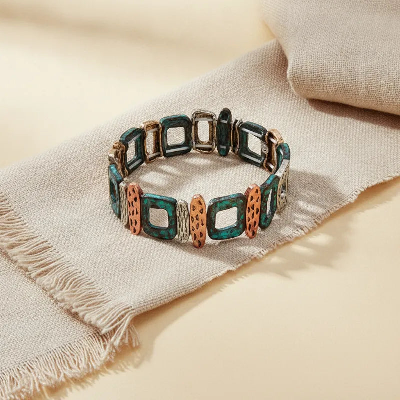 Patina geometric stretch bracelet with colorful rectangular links featuring turquoise and copper finish