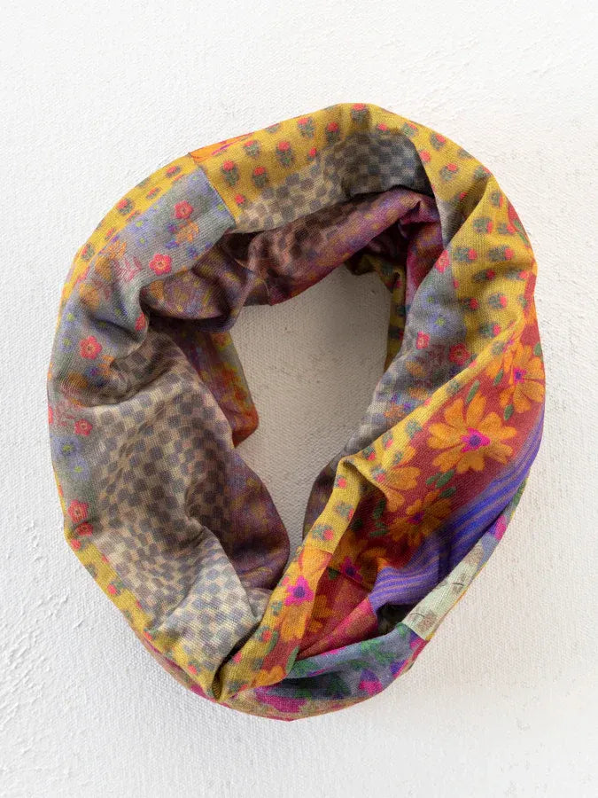 Colorful patchwork infinity scarf with floral and geometric patterns in yellow purple pink and gray for garden waves boho bandeau headband