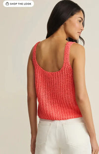 Coral-colored knitted tate laceup sweater tank with a textured sleeveless design and open back for stylish layering