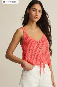 Coral-colored knitted laceup sweater tank tate laceup sweater with sleeveless design and drawstring hem