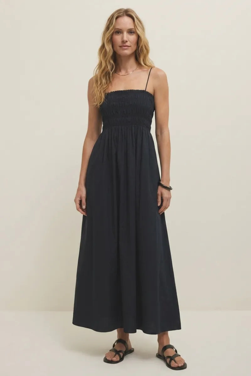 Navy blue cornelia poplin maxi dress with thin spaghetti straps and a gathered waist for elegant wear