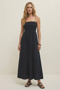 Navy blue cornelia poplin maxi dress with thin spaghetti straps and a gathered waist for elegant wear