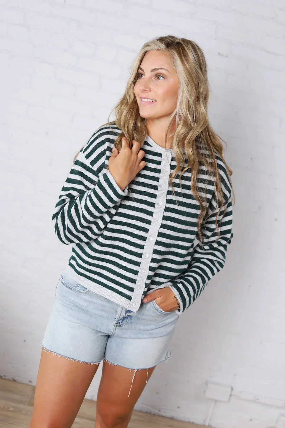 Thread and supply dover button long-sleeved cardigan with bold dark green and white horizontal stripes for cozy wear