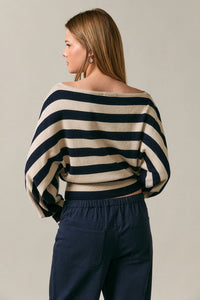 Boat neck dolman sweater top with bold navy and cream stripes featuring wide flowing dolman sleeves