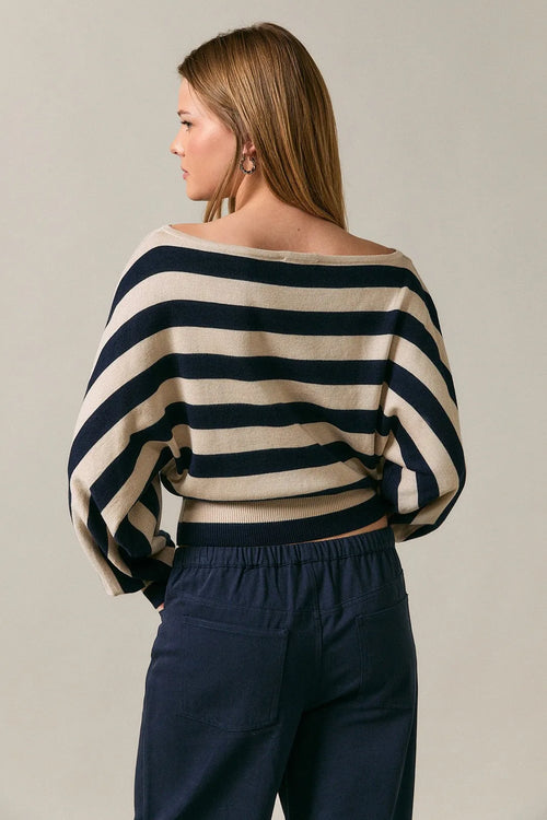 Boat neck dolman sweater top with bold navy and cream stripes featuring wide flowing dolman sleeves