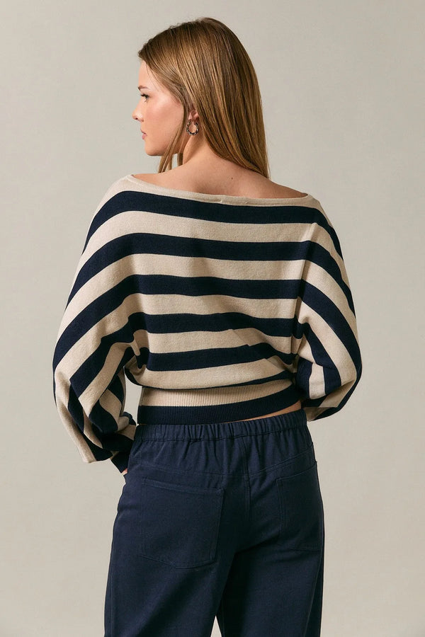 Boat neck dolman sweater top with bold navy and cream stripes featuring wide flowing dolman sleeves