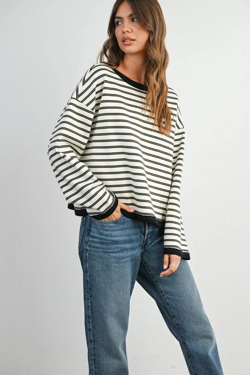 Striped loose fit long sleeve top with black and white stripes