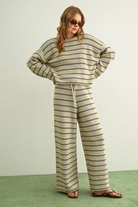 A cozy ribbed knit striped pattern long sleeve sweater set in soft beige and dark gray for comfortable wear