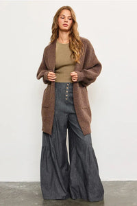 Cozy brown knit cardigan over button front tiered wide pants