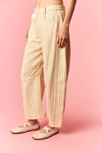 Cream and beige checkered wide-leg trousers in washed gingham printed twill with a relaxed fit barrel style