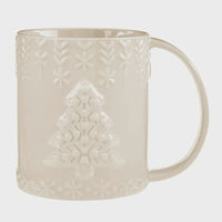 Cream-colored ceramic embossed holiday mug featuring a Christmas tree design surrounded by snowflake patterns
