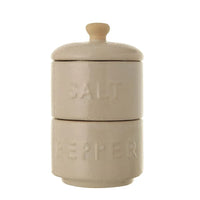 Cream-colored ceramic stackable salt and pepper pots with wooden knob lids ideal for women’s boho chic clothing kitchen use