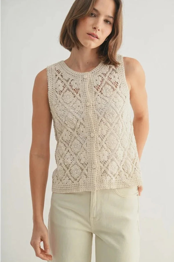 Cream crochet sleeveless button down top with diamond pattern