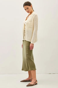 Breezy textured knit cream cardigan with button closure