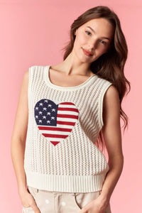 Cream-colored sleeveless top featuring a heart-shaped American flag design in america pointelle knit fabric