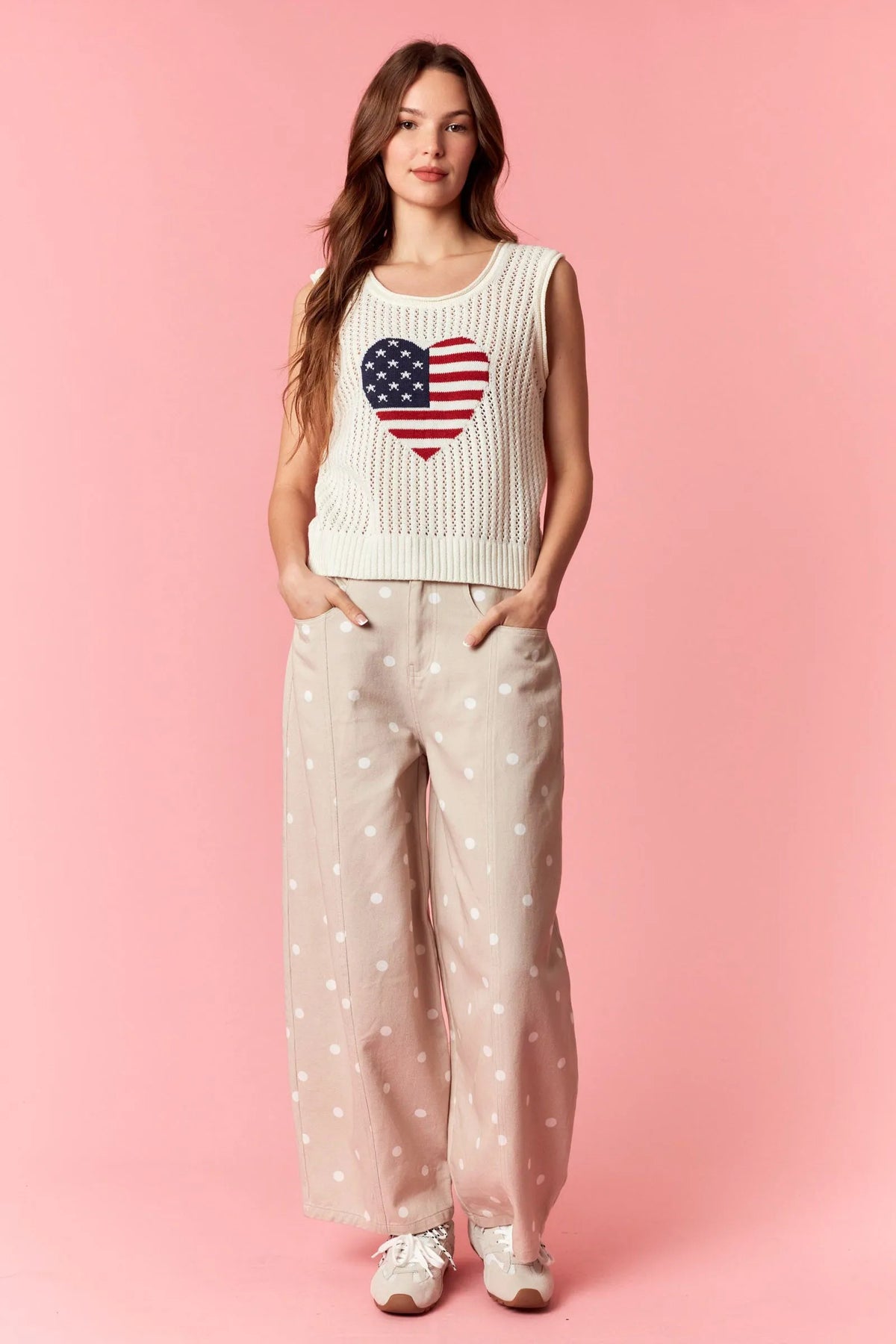 Cream-colored sleeveless america pointelle knit top with heart-shaped american flag design for casual wear