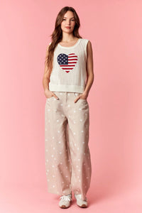 Cream-colored sleeveless america pointelle knit top with heart-shaped american flag design for casual wear
