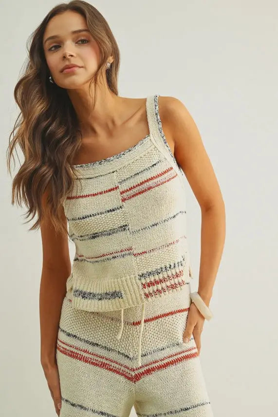 Cream-colored knitted multi color stripe tank top with red and navy blue horizontal color stripe pattern and square neckline