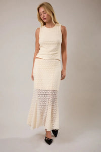 Cream-colored cream lace mid rise midi half lined two-piece set with fitted top and flared skirt intricate patterns